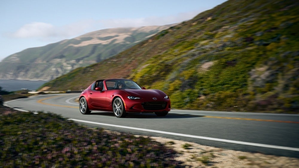 Experience pure driving exhilaration with the 2025 Mazda MX-5 Miata RF, engineered for precision and performance at 495 Mazda.